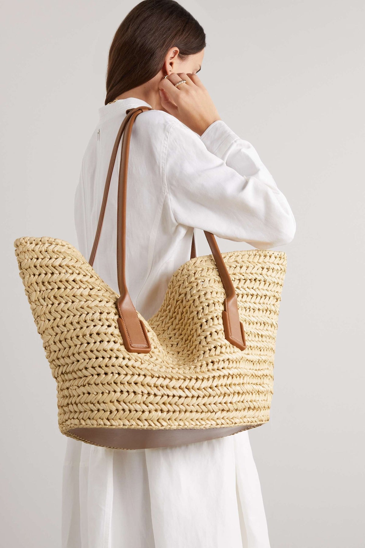 BOTTEGA VENETA Medium leather-trimmed raffia tote